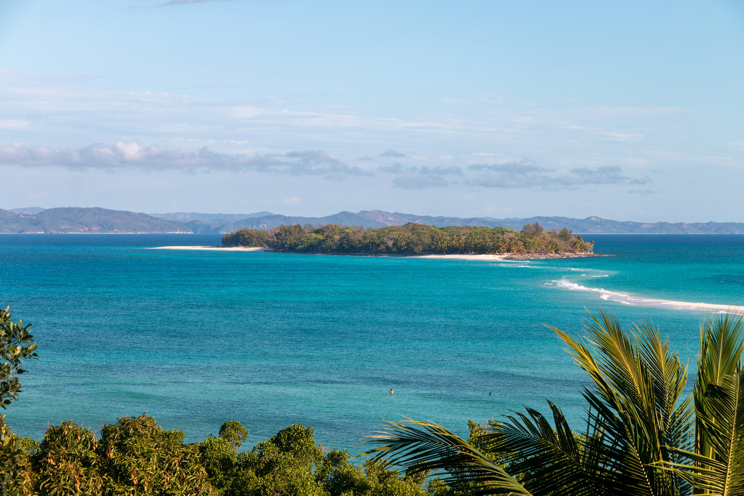 Turquoise lagoon and wooded islets off Nosy Be