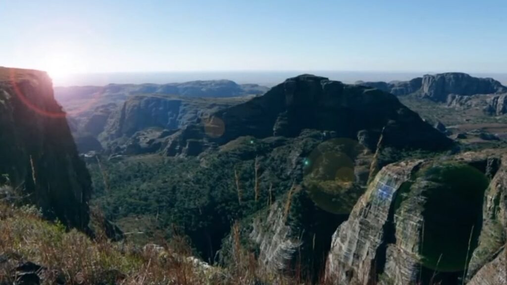 Sunlit panorama of mountains and wooded canyons in Madagascar