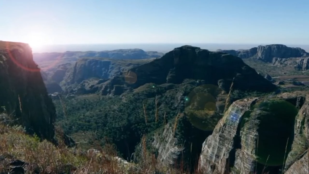Sunlit panorama of mountains and wooded canyons in Madagascar